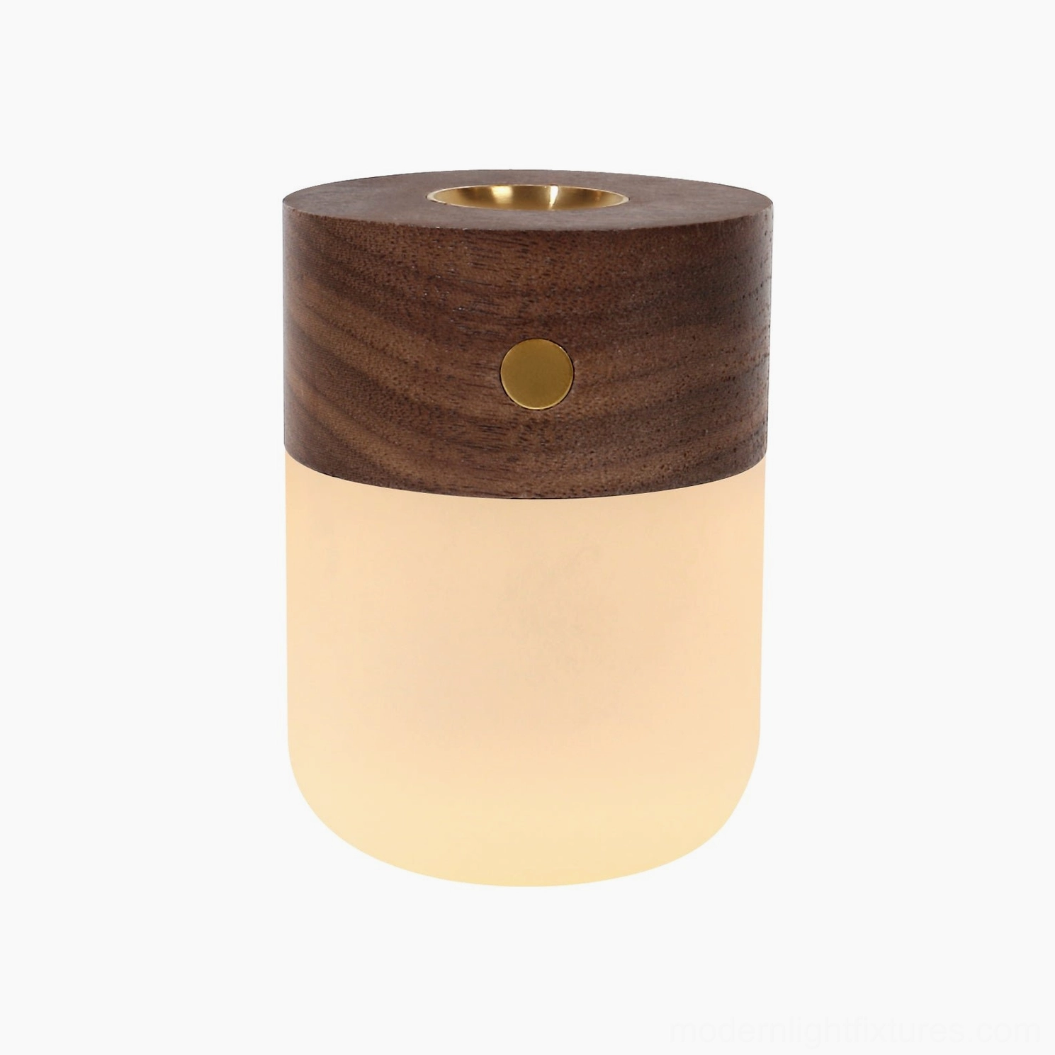 Three-quarter angle of wooden aroma diffuser lamp with glowing frosted glass showing ambient lighting effect