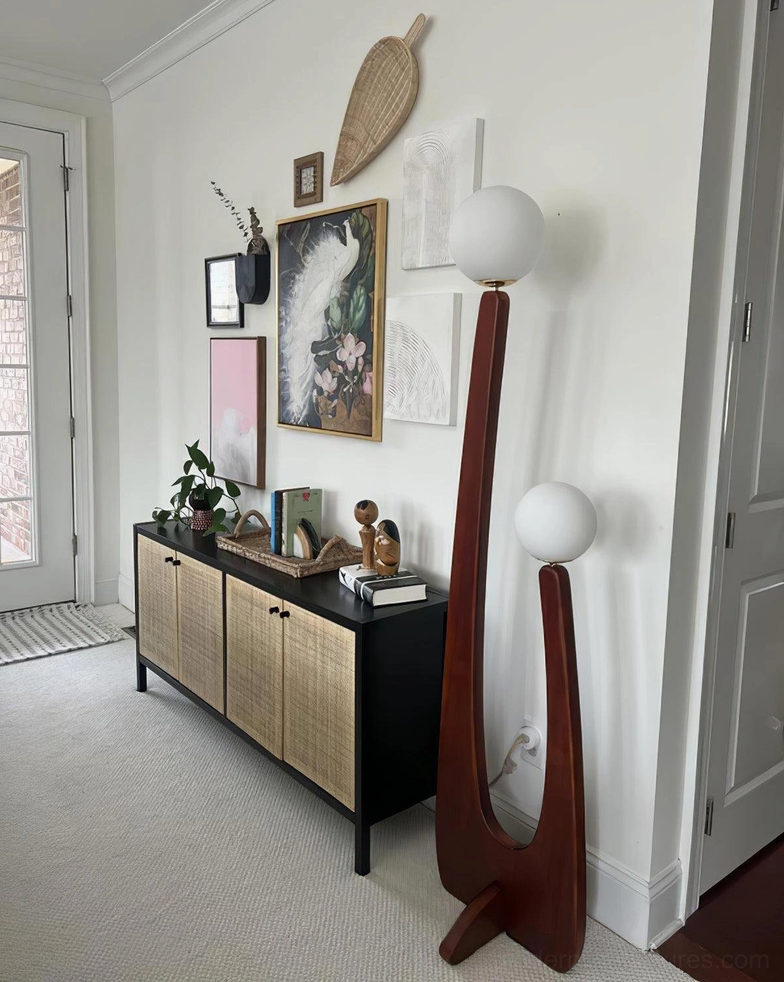 Sculptural oak base floor lamp showing natural wood grain and finish quality, front facing view