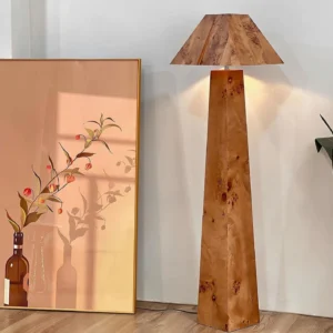 Modern wooden floor lamp three-quarter side view in minimalist home interior with wall art