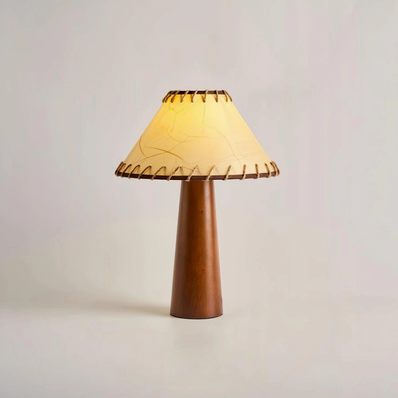 Wooden table lamp with hand-stitched jute shade detail showing European and North American plug options available