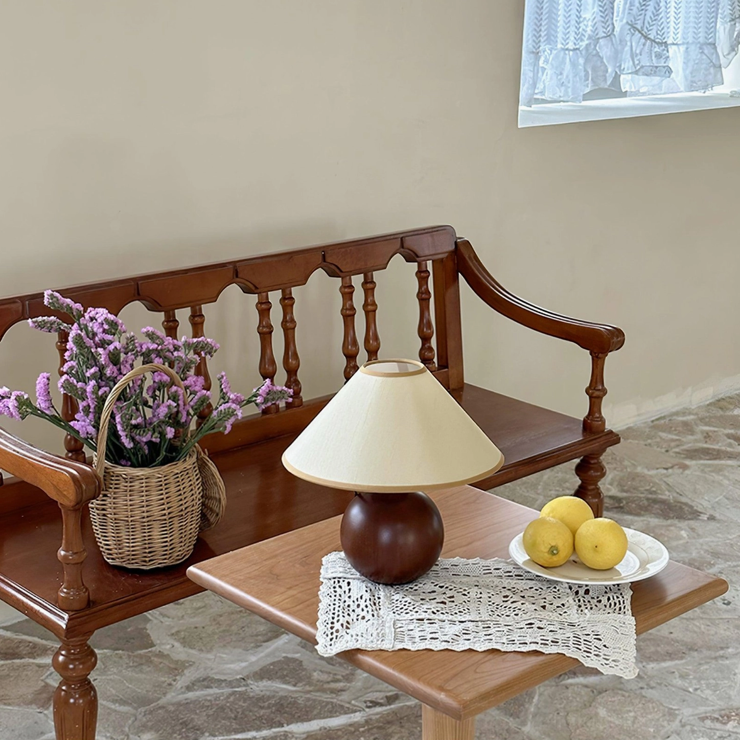 Natural wooden base table lamp, side angle view showing spherical base construction