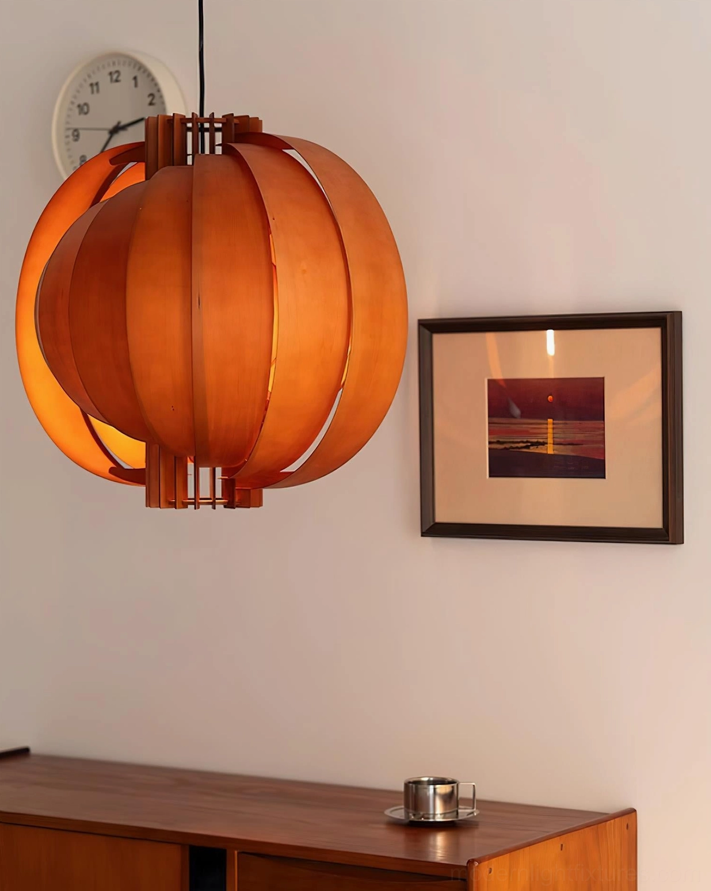 Natural wood wooden lantern pendant light hanging in contemporary kitchen above island counter