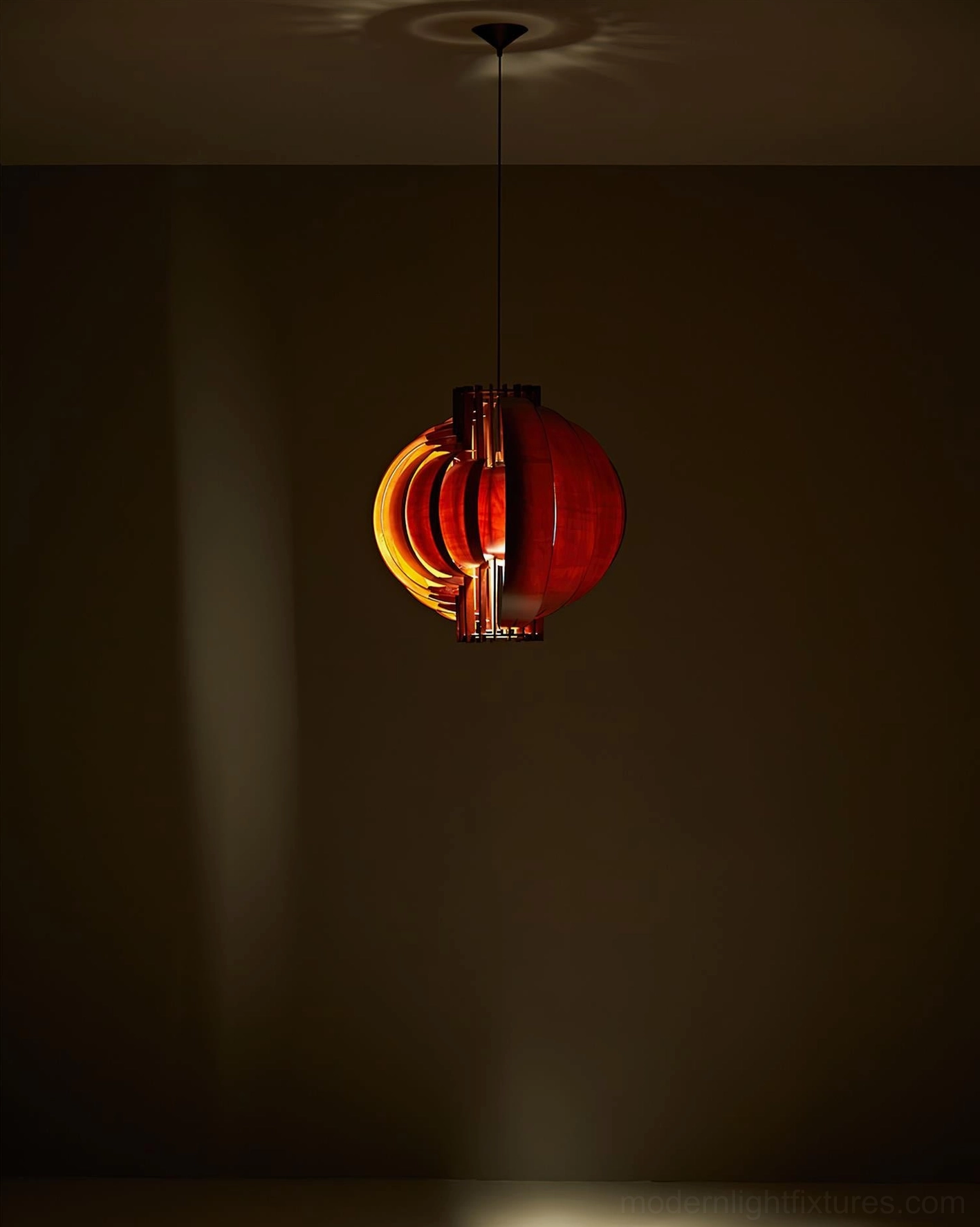 Close-up view of wood globe pendant light showing natural grain characteristics and artisanal finish details
