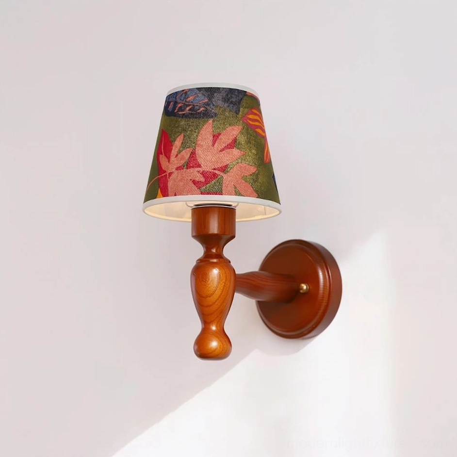 Artisan wood sconce with textured fabric lampshade, warm walnut finish detail