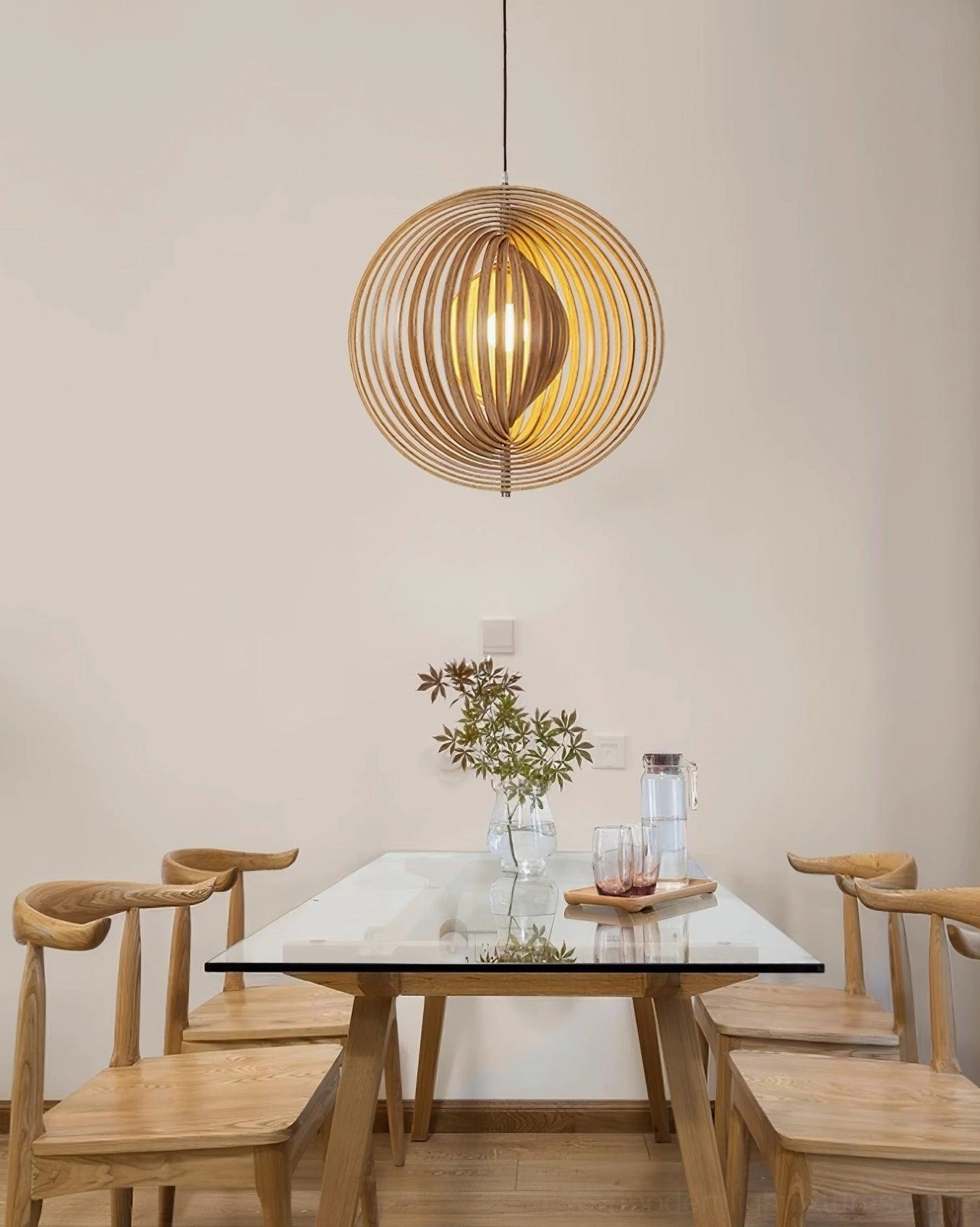 Wooden sphere pendant light closeup showing natural wood grain finish and slat construction quality