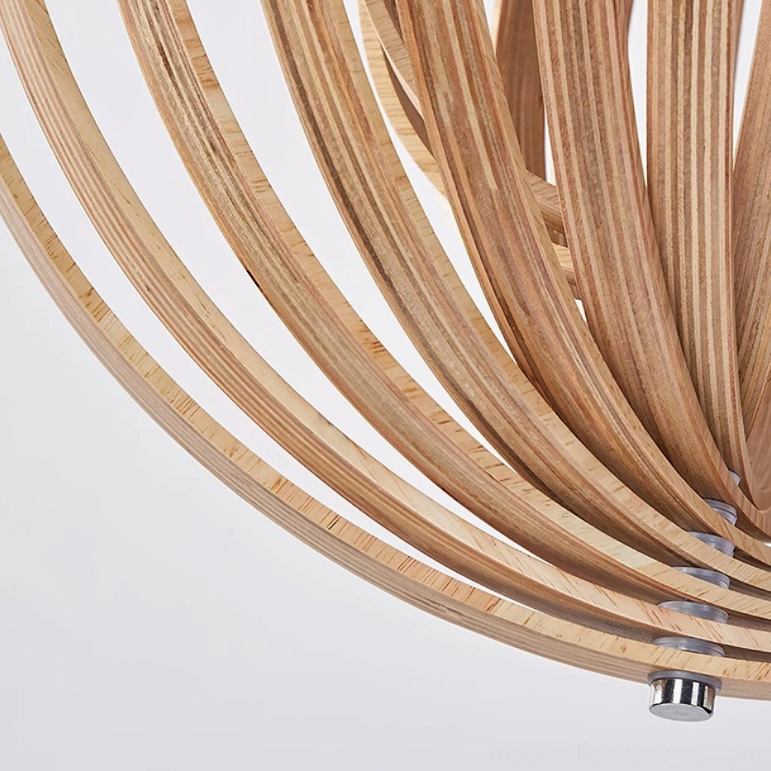 Wooden sphere pendant light providing soft warm glow in bedroom reading nook corner design