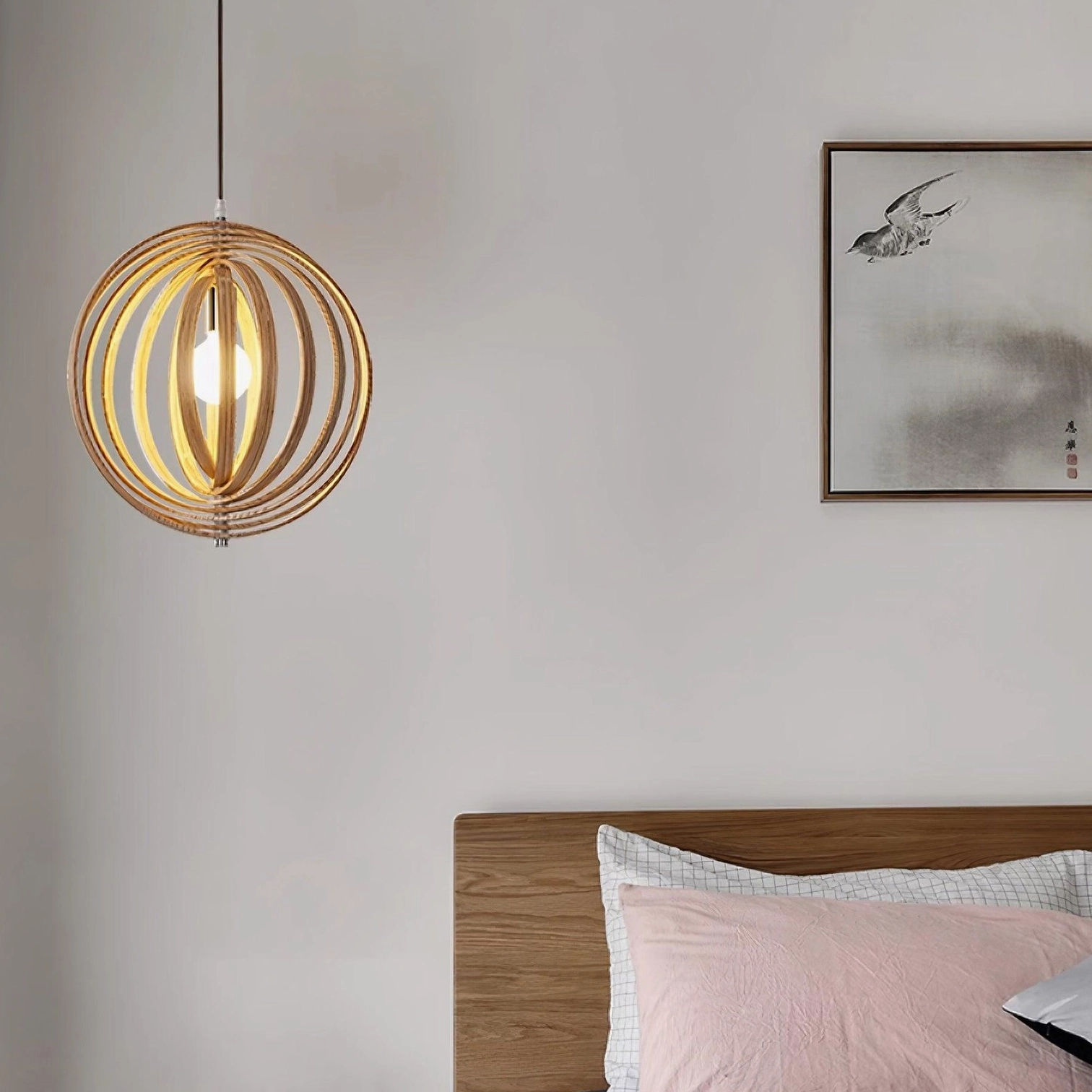 Wooden sphere pendant lamp hanging in scandinavian style living room with neutral decor aesthetic