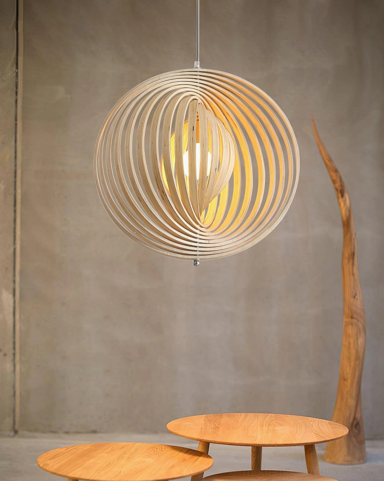 Front low angle view of wooden sphere pendant light with glowing bulb showing smooth wood slat texture