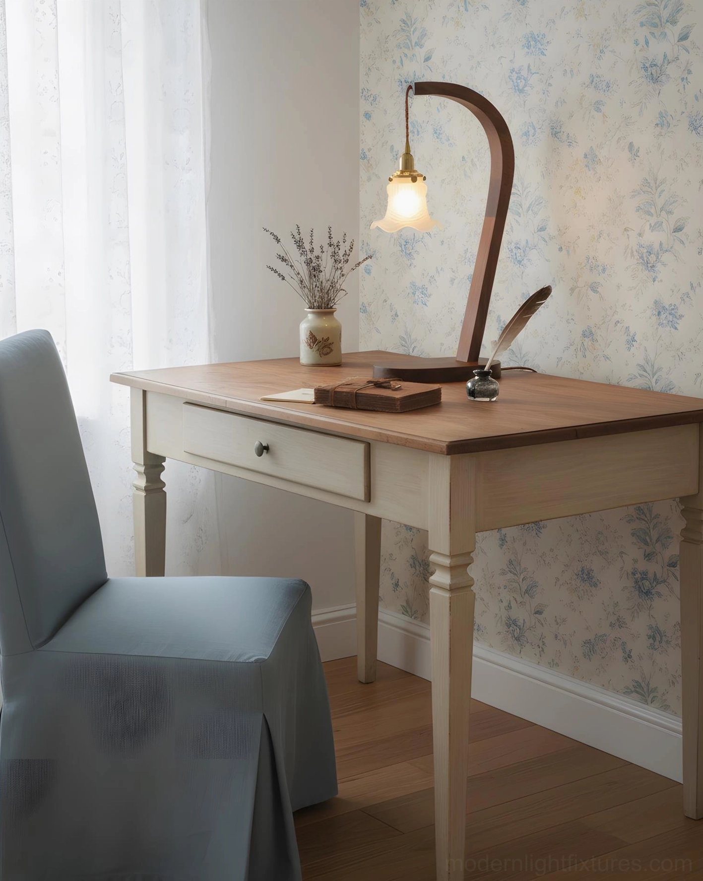 Walnut wood table lamp in home office workspace on wooden desk with floral wallpaper