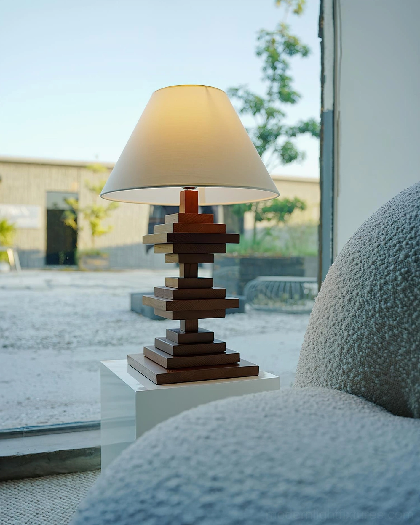 Stacked wood tower table lamp architectural close-up showing premium solid wood construction and fabric shade detail