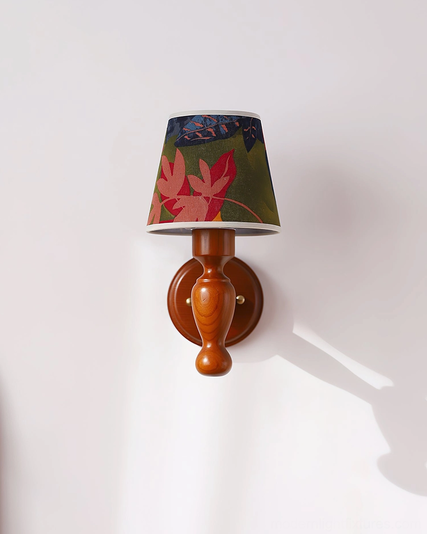 Wooden wall lamp with fabric shade detail, warm finish demonstration
