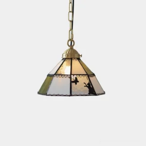 Woodland stained glass pendant lamp with rabbit and butterfly motifs, forest green and opalescent white glass panels, brass fixture overhead view