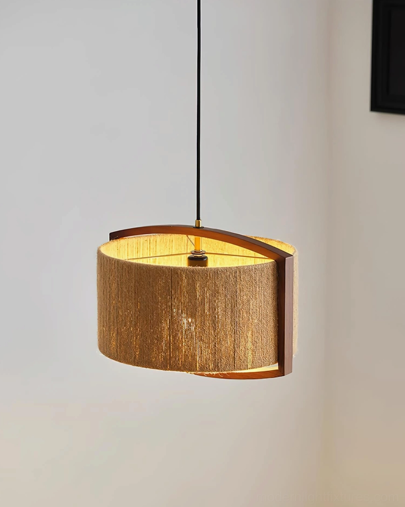 Modern woven jute pendant light side profile showing internal socket and exposed wooden frame edge