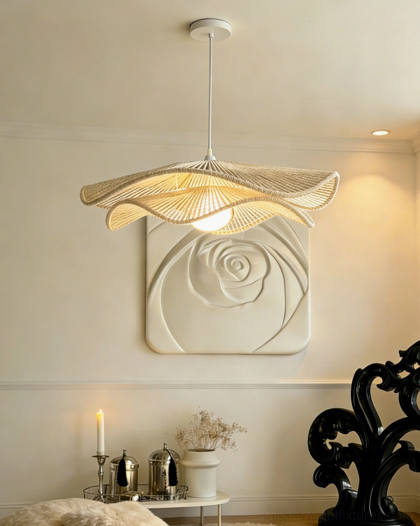 Sculptural woven pendant light above accent wall with rose relief art, warm filtered glow creating artistic shadow play and ambiance