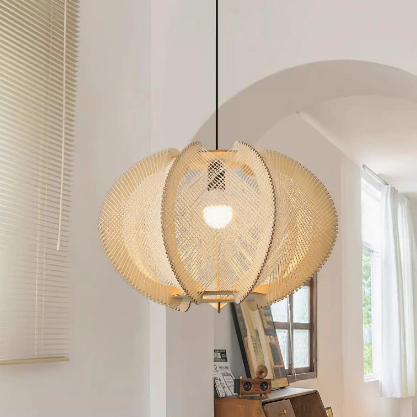 Natural wood and white fabric woven pendant light in Scandinavian interior design