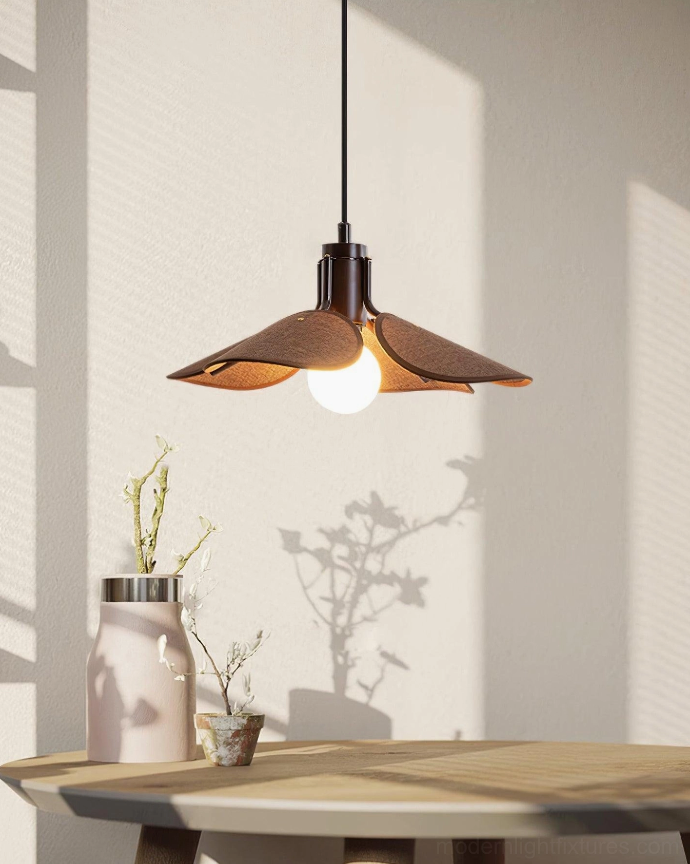 Woven rattan pendant light side angle view casting warm shadows in sunlit dining area
