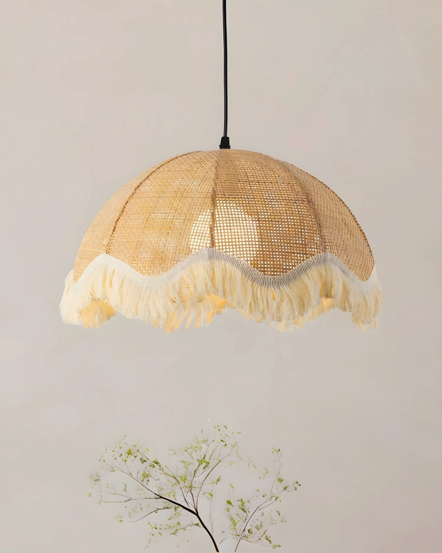 Woven rattan fringe pendant light detailed close-up, showing scalloped cotton fringe trim and open-weave rattan dome construction