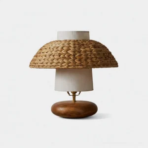Woven rattan table lamp with natural wood base - front view on white background showcasing two-tiered shade and solid round base