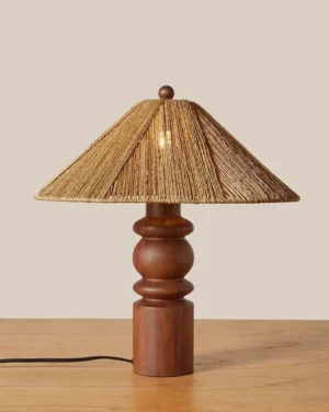 Bohemian style table lamp three-quarter angle tan raffia woven shade dark walnut base rustic design