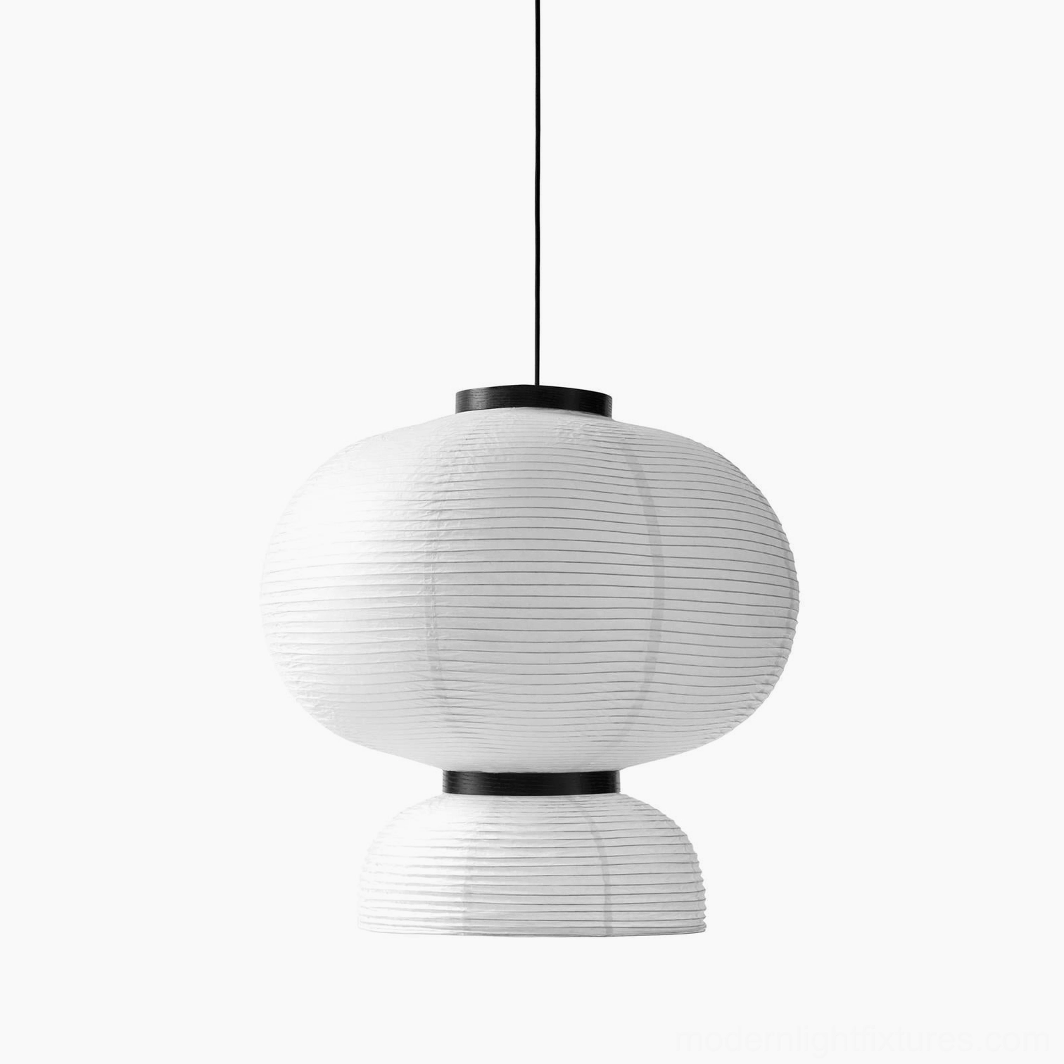 Xuan paper pendant lamp illuminated in contemporary dining environment, ambient view