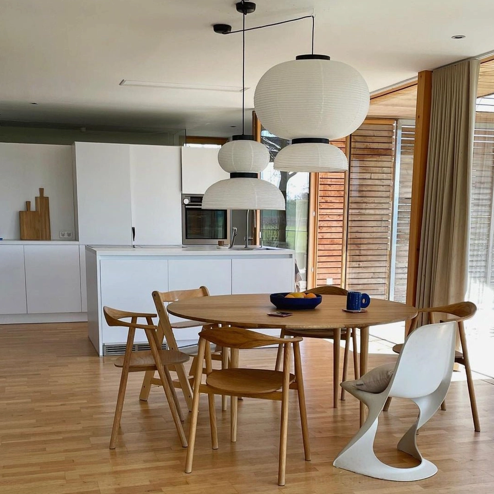 Xuan paper pendant lamp installed in minimalist modern interior, overhead perspective
