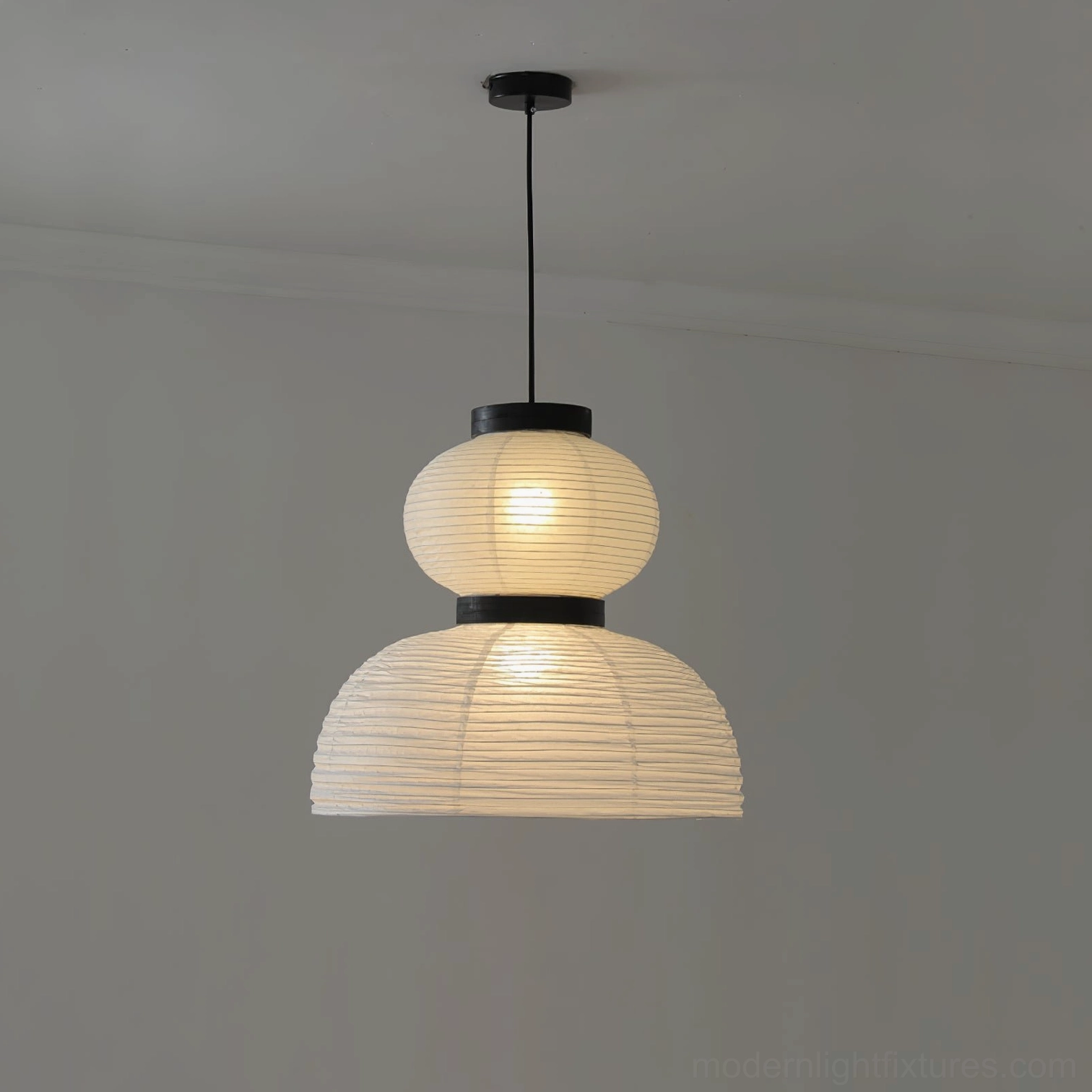 Xuan paper pendant lamp in contemporary living space with modern architectural features
