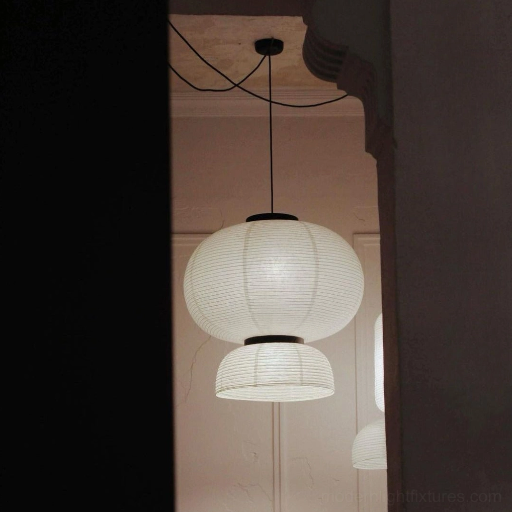 Multiple Xuan paper pendant lights installed in gallery-style arrangement over counter