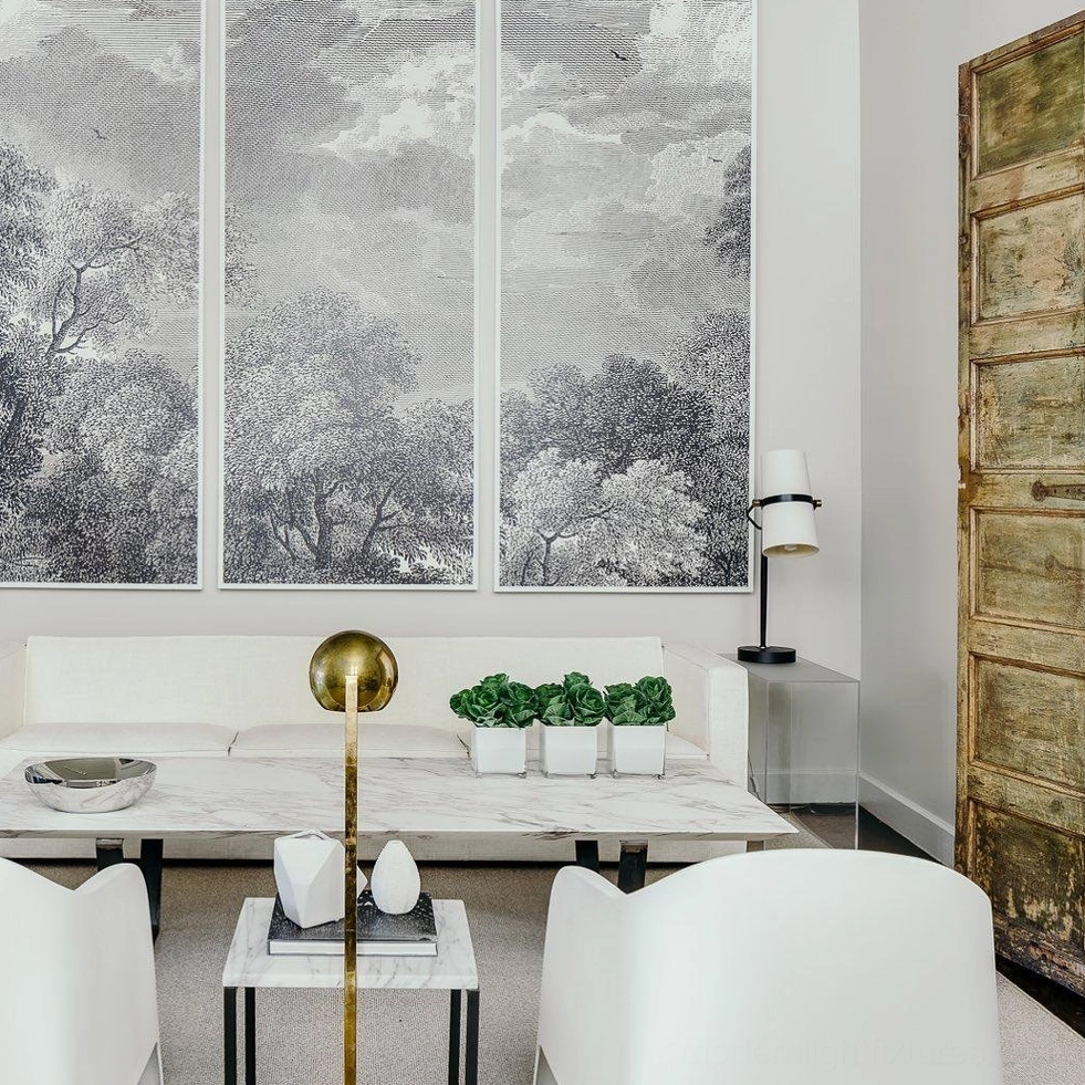 Yasmin modern table lamp in luxury sitting room with landscape wall art