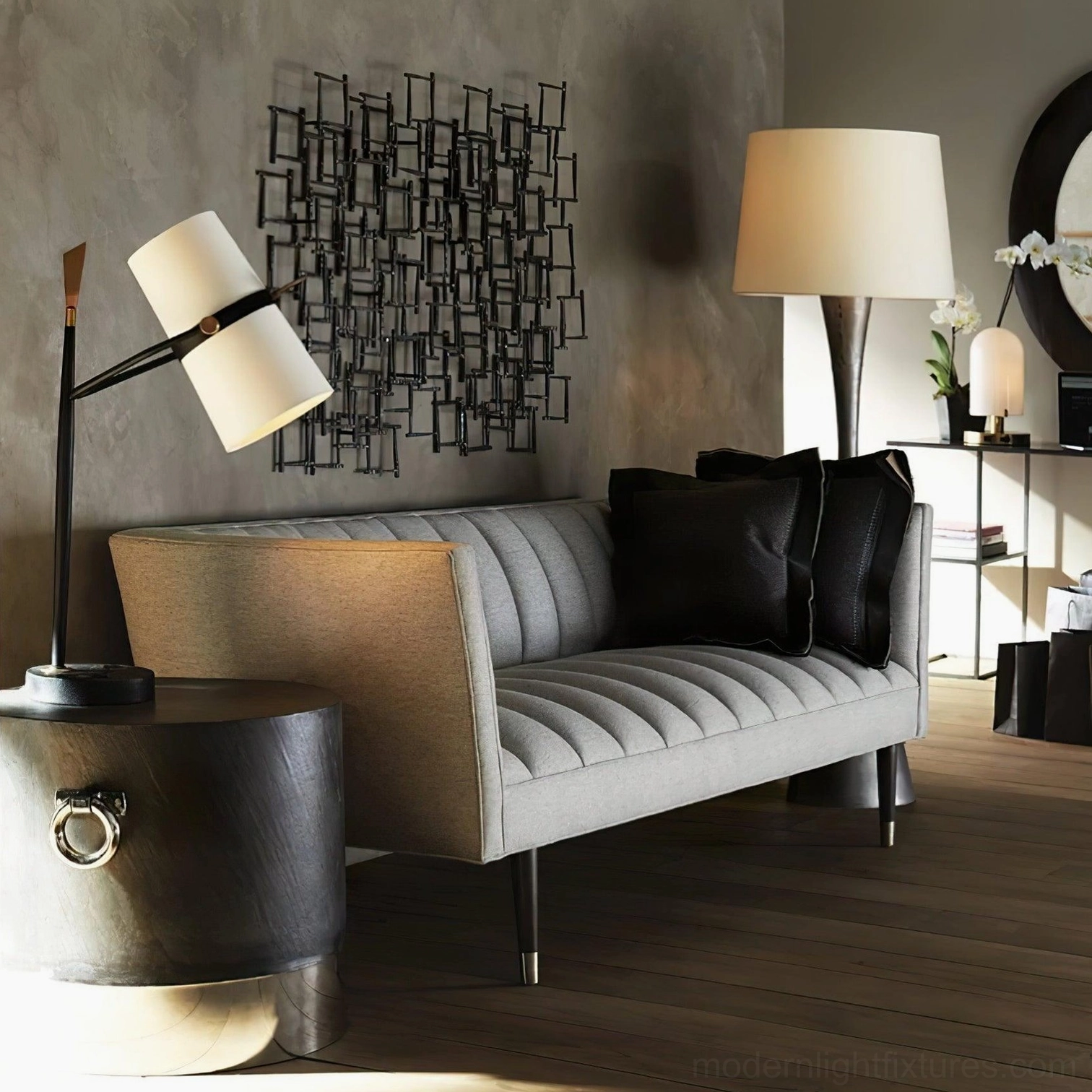 Yasmin modern table lamp in contemporary living room beside tufted sofa