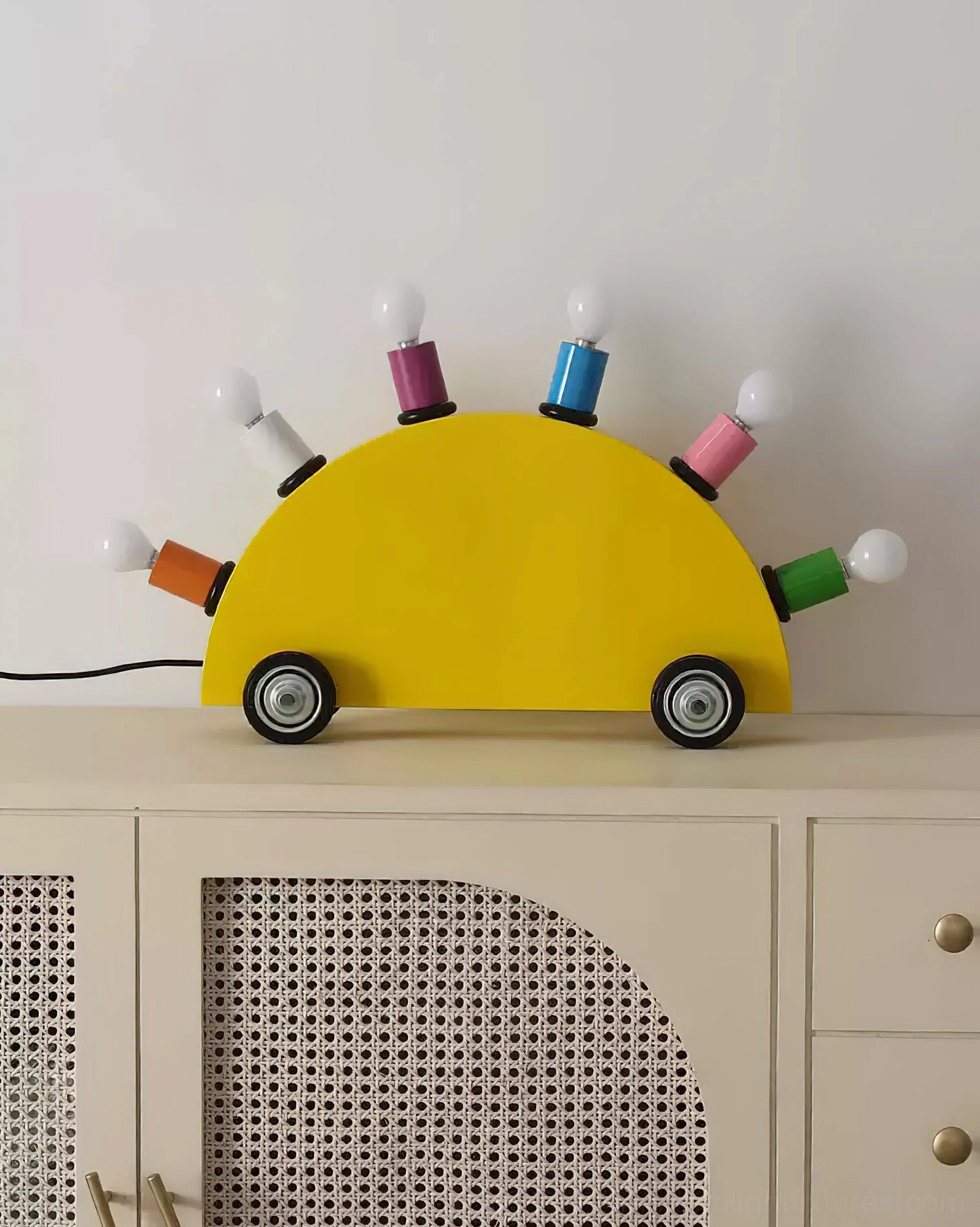 Yellow cartoon car table lamp rattan cabinet display colorful bulb details rubber wheels
