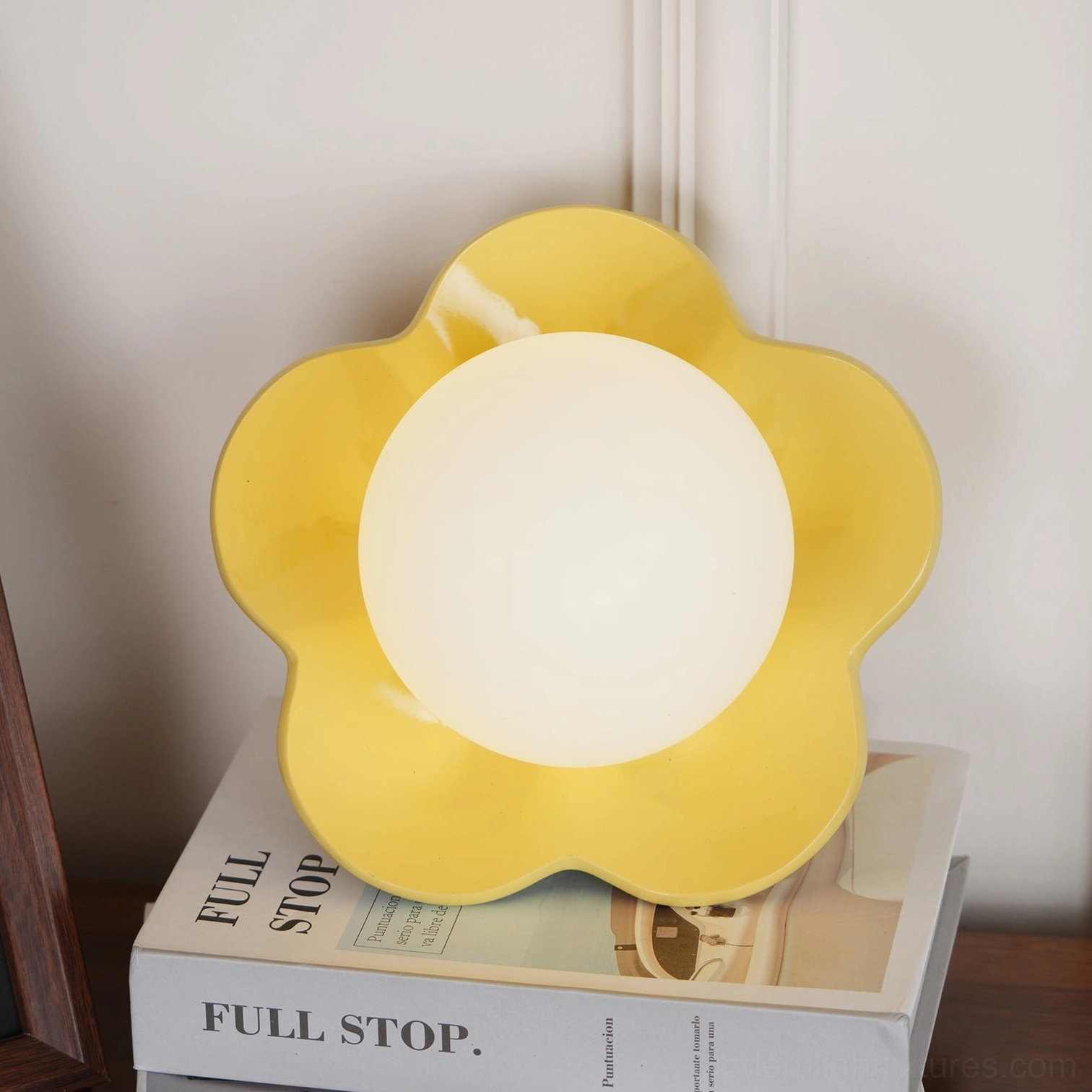 Yellow flower wall lamp demonstrating dimmable warm light in evening home setting