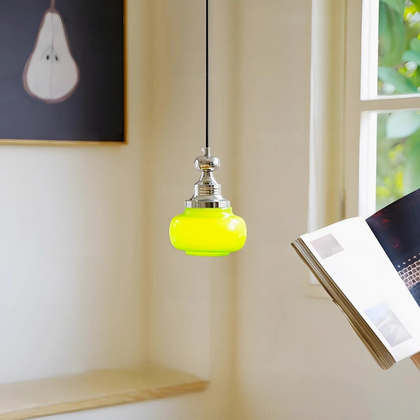 Yellow glass pendant light with chrome hardware side view retro minimalist interior styling