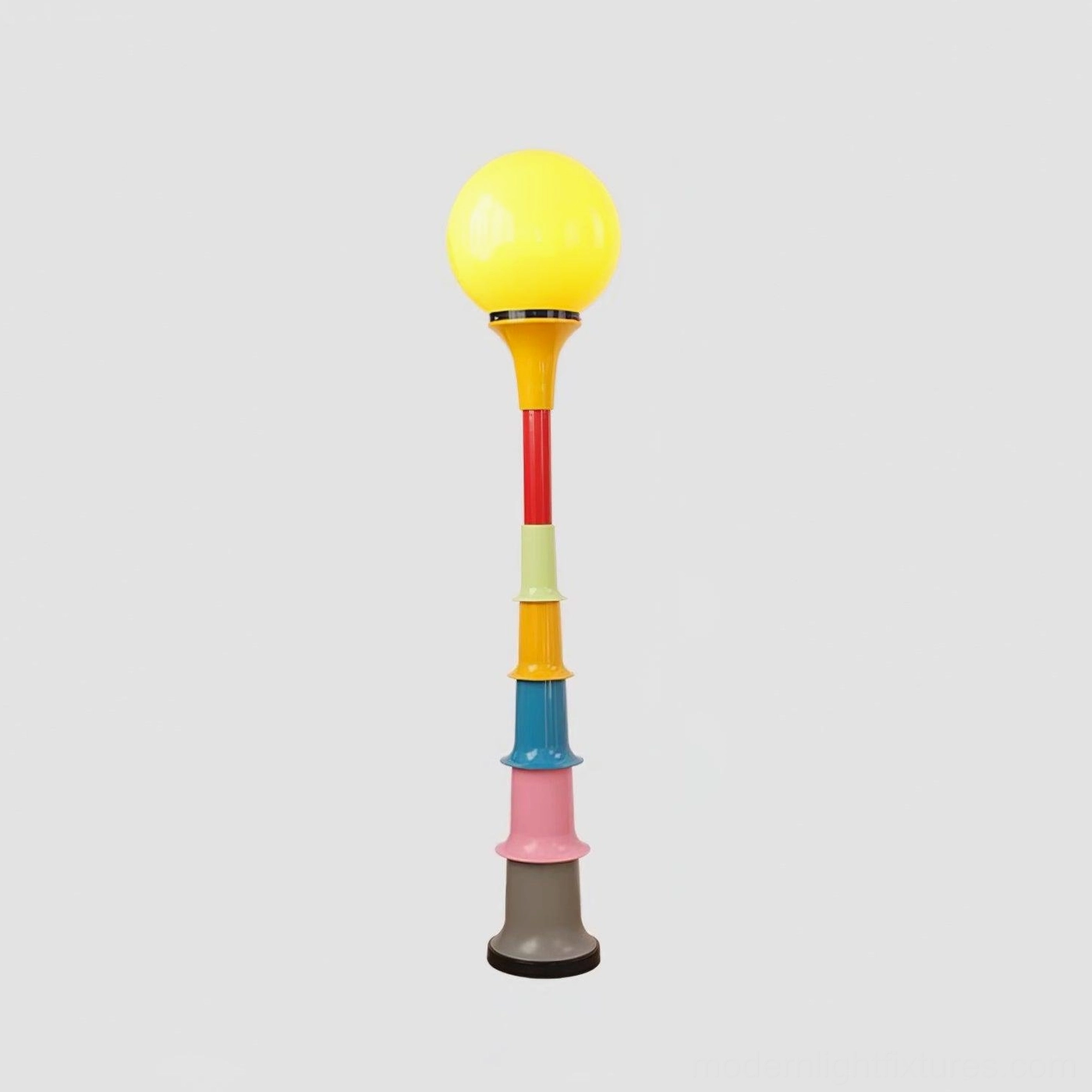 Grande floor lamp with yellow globe shade variant displayed in modern home décor
