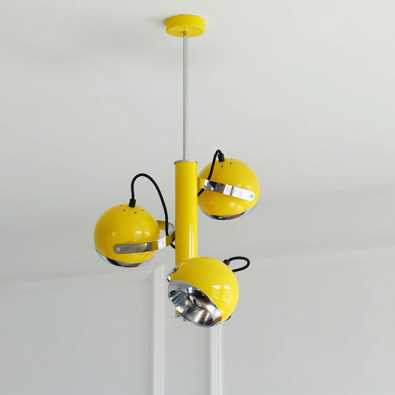Yellow Sputnik pendant lamp hanging at optimal height above dining surface