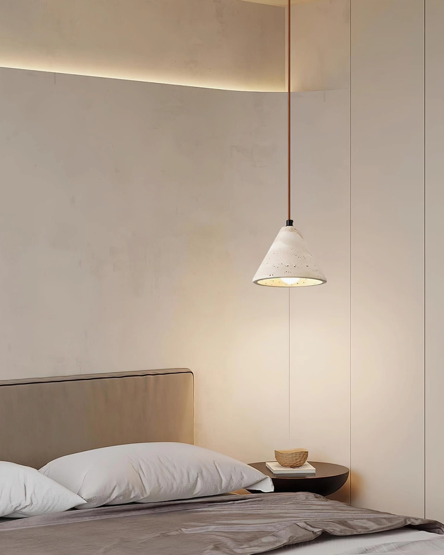 Modern stone pendant light with yellow travertine shade demonstrating authentic pores and natural variations