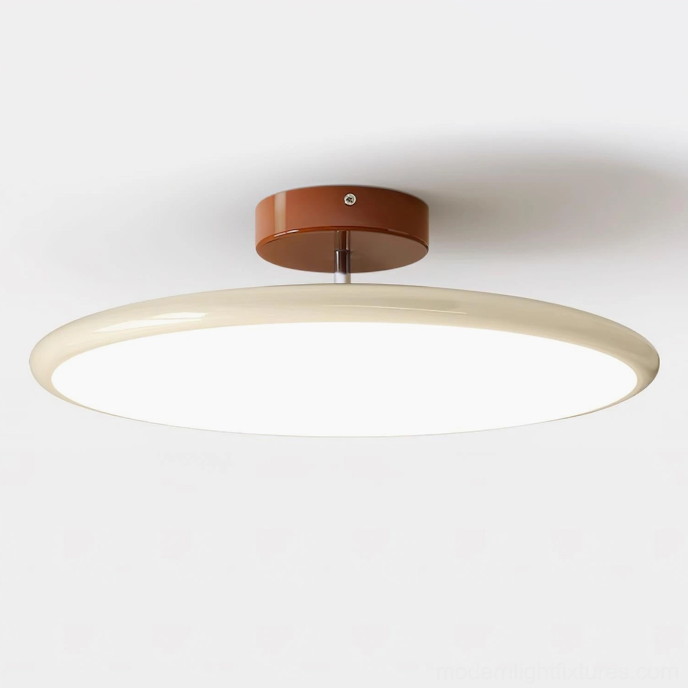 Zayn flush mount ceiling light with cream white acrylic disc and sleek flat design, front studio close-up view