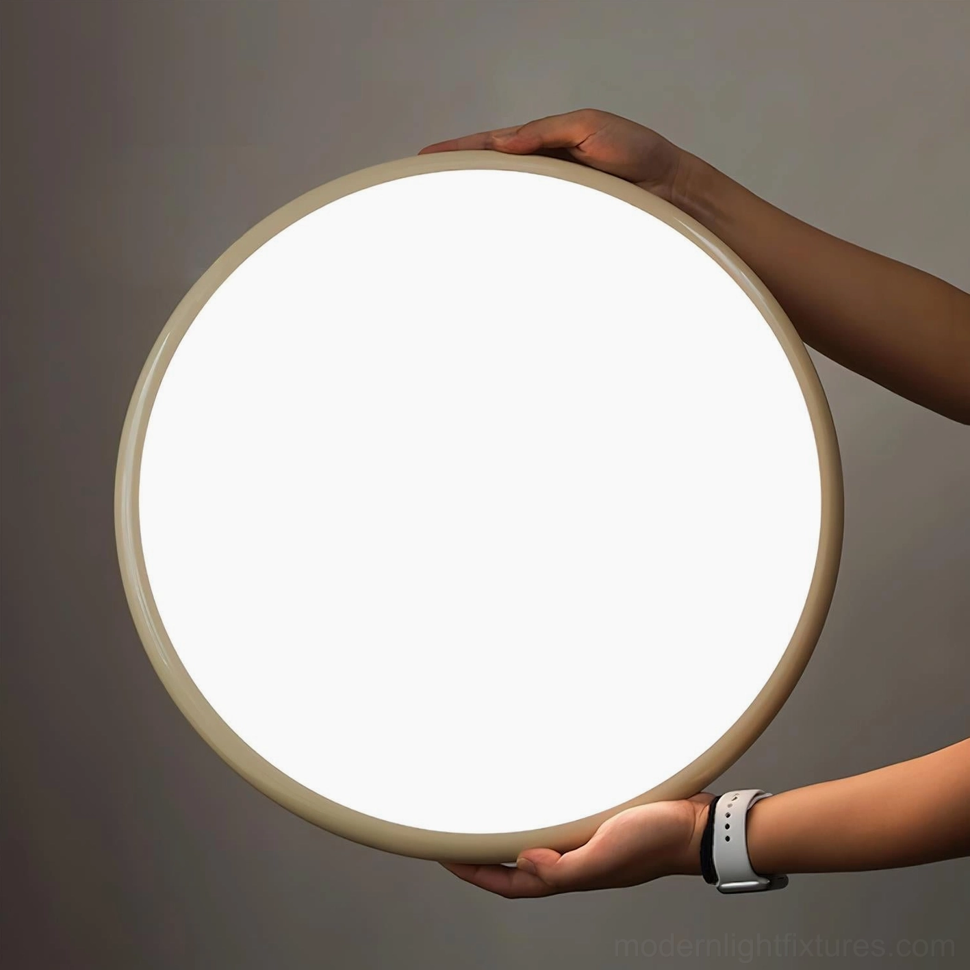 Zayn modern ceiling fixture close-up detail showing warm 3000K LED integrated panel and acrylic disc edge