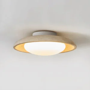 Zen Glow beige travertine round ceiling light fixture - close-up detail with warm glow