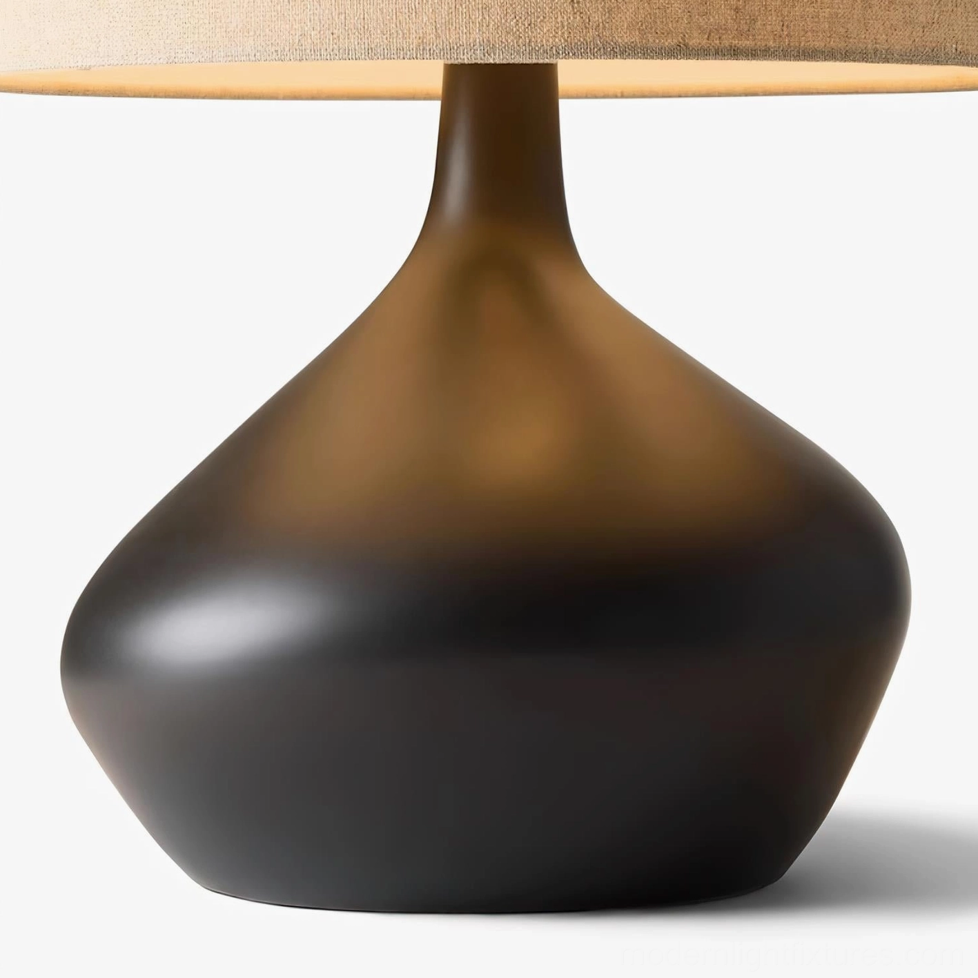 Modern zen table lamp sculptural ceramic base with organic curved form and minimalist textile shade detail
