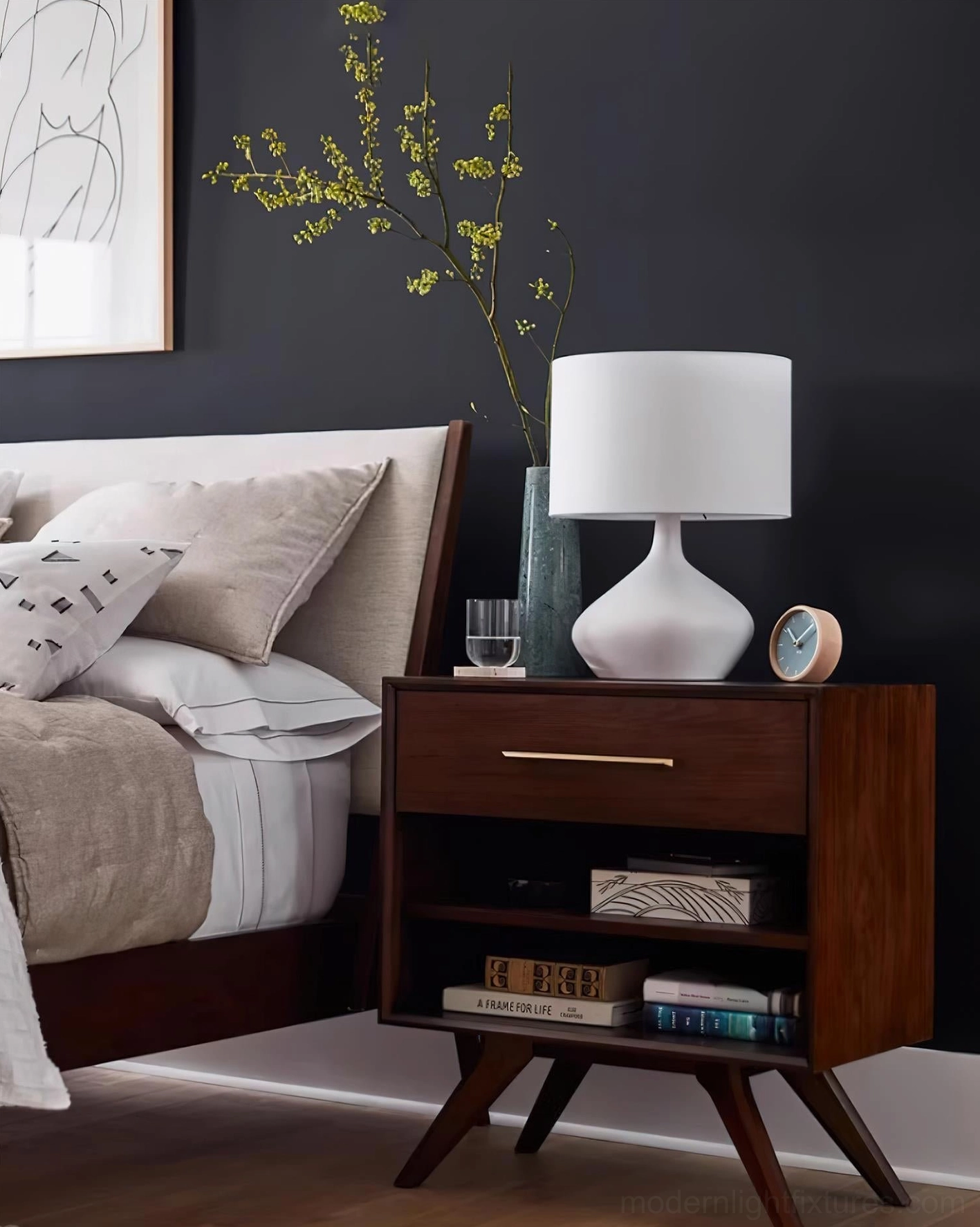 White sculptural zen table lamp on living room sideboard with botanical decor, minimalist interior styling