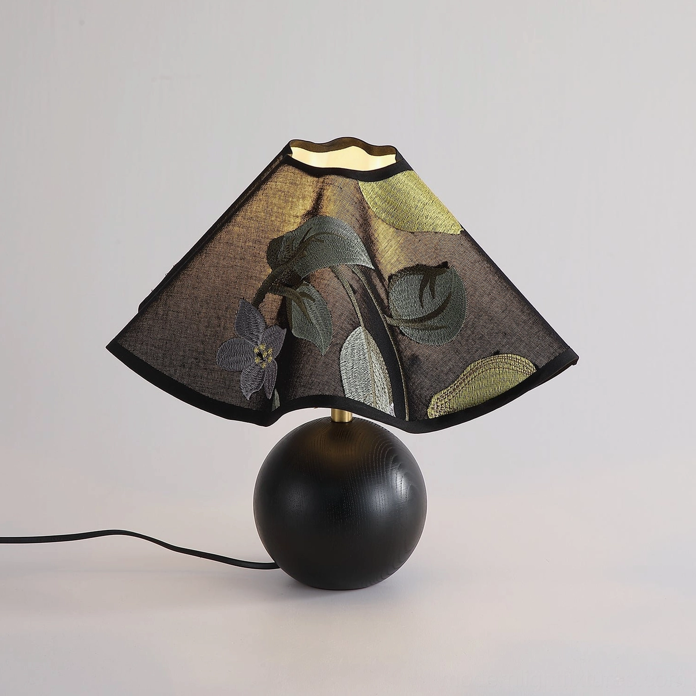 Zerina table lamp black variant with floral embroidered shade detailed product shot