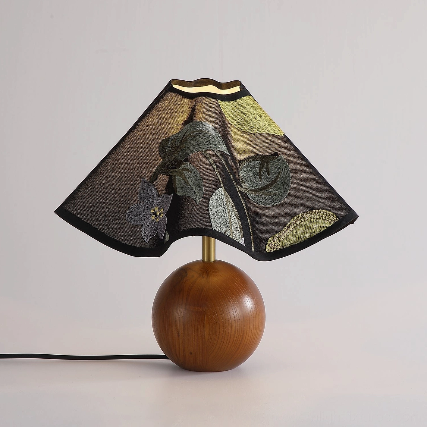 Zerina table lamp with walnut wood base studio product photography showing design features