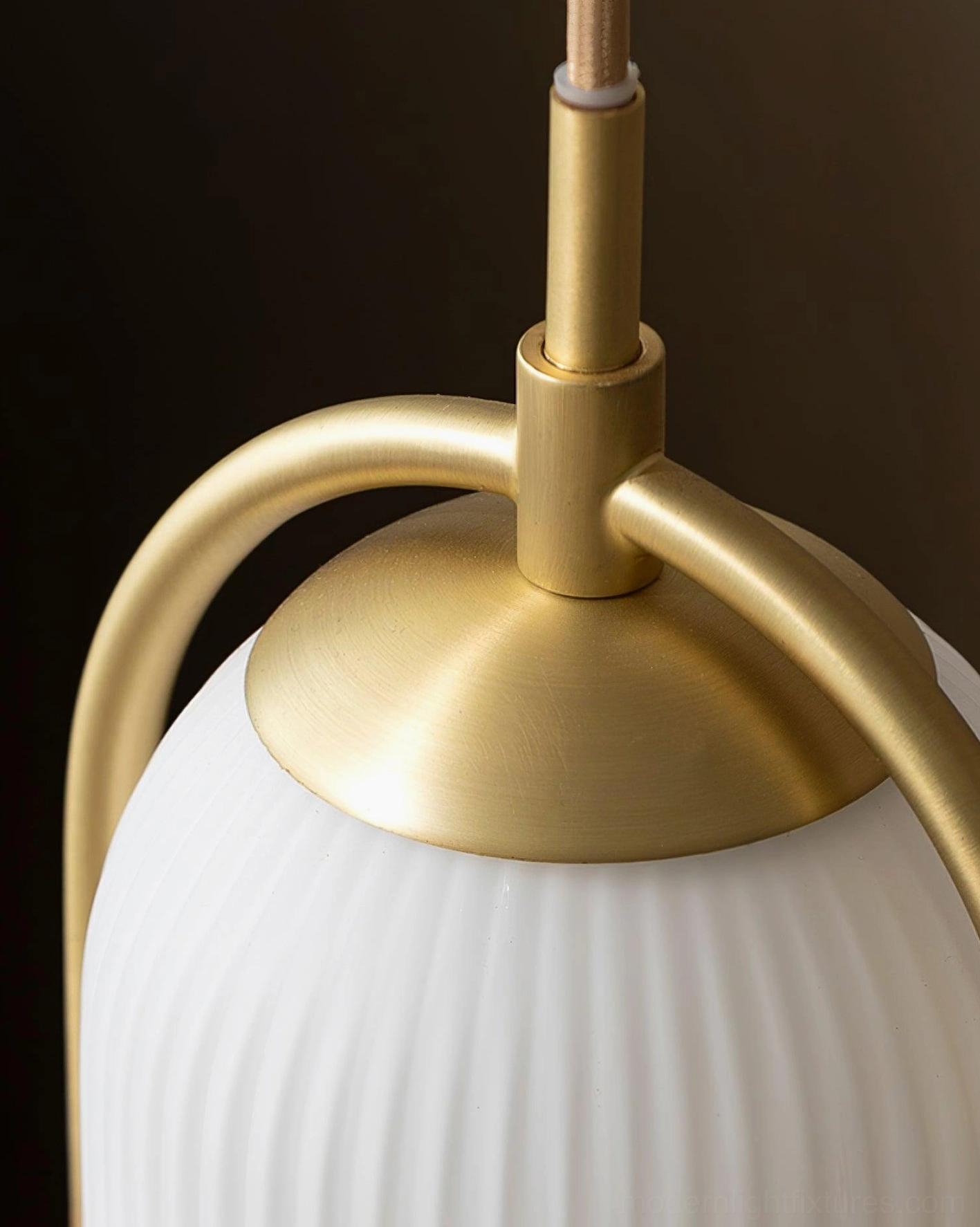 Zesta minimalist glass pendant light hardwired installation creating sculptural modern ceiling statement