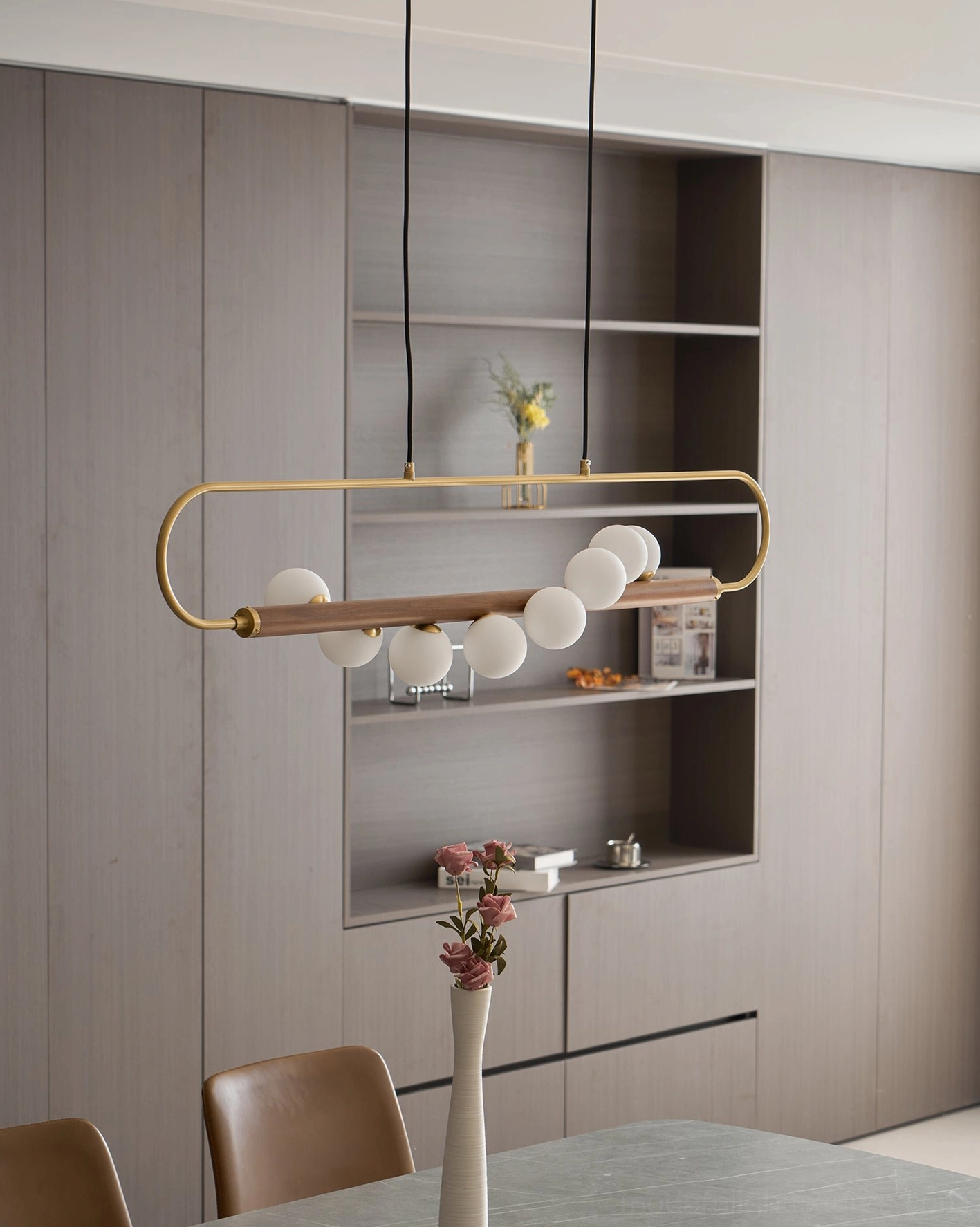 Zeta Linear Chandelier dramatic angle shot emphasizing architectural presence and sculptural quality as unlit ceiling fixture