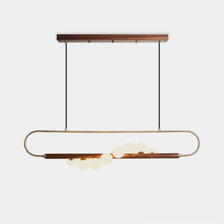 Zeta Linear Pendant installed in minimalist Scandinavian interior with clean lines and coordinated natural wood accents